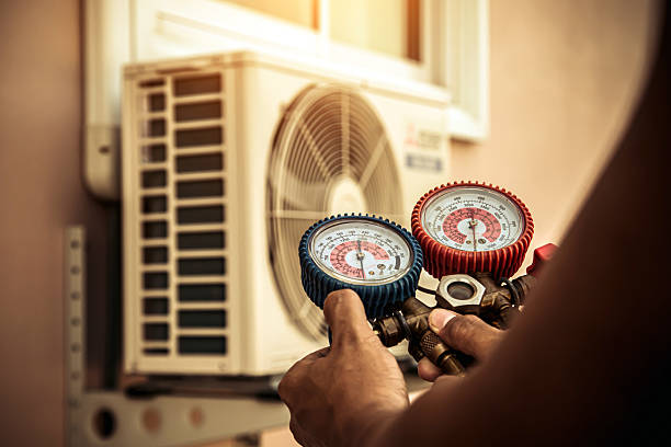 Professional Ac Installation technician working in Pennville, IN